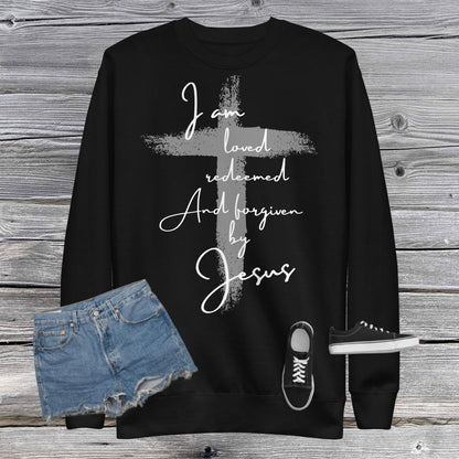 White Print Loved Redeemed and Forgiven by Jesus Unisex Fleece Pullover