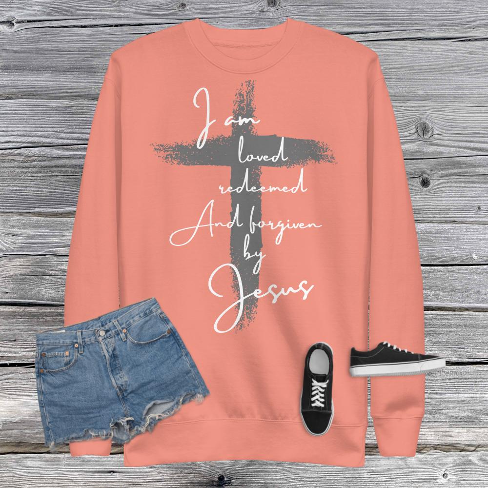 White Print Loved Redeemed and Forgiven by Jesus Unisex Fleece Pullover