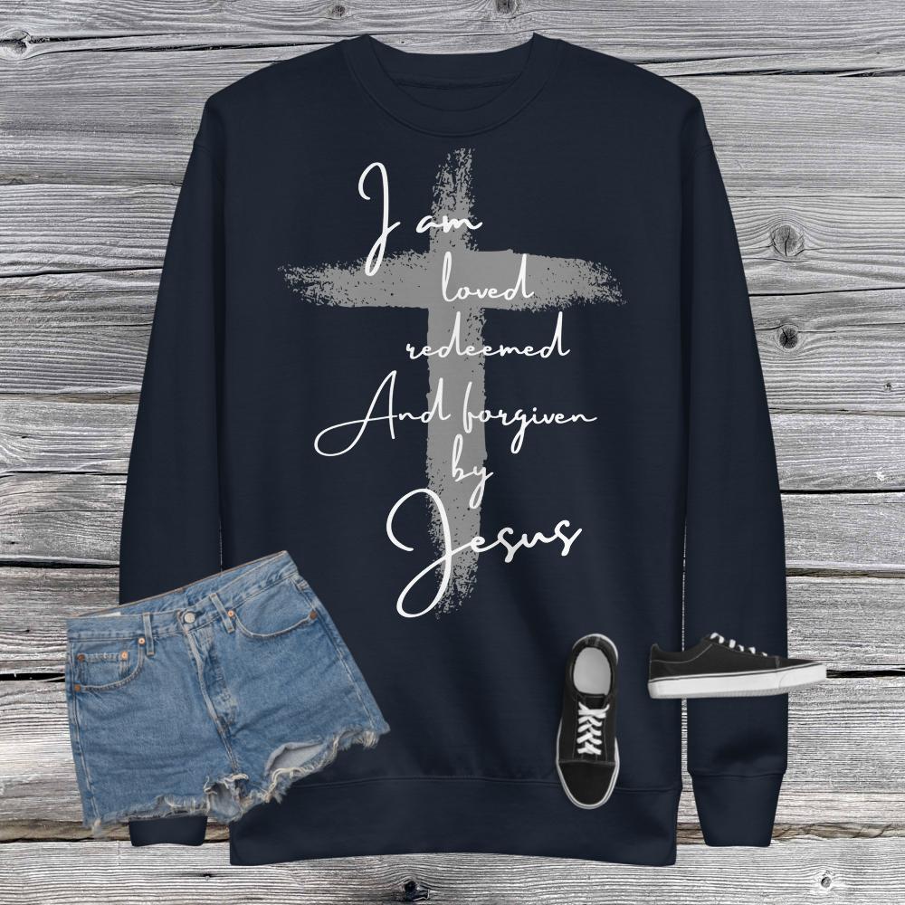 White Print Loved Redeemed and Forgiven by Jesus Unisex Fleece Pullover