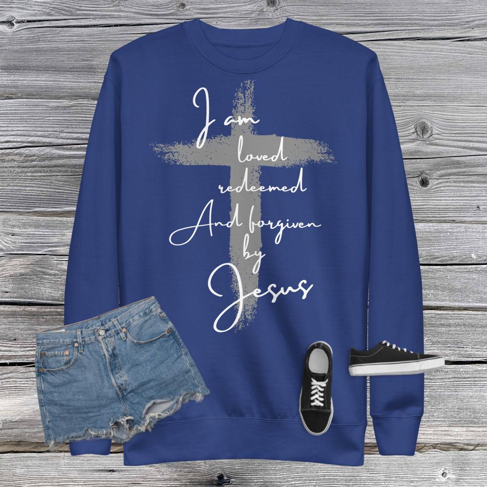 White Print Loved Redeemed and Forgiven by Jesus Unisex Fleece Pullover